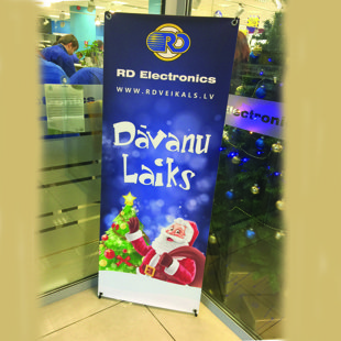 Baneris ievietots x stendā